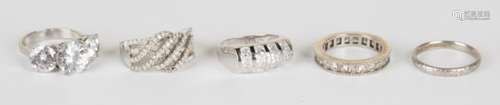 A platinum decorated wedding ring, detailed 'Platinum', a 9ct white gold and diamond ring in a