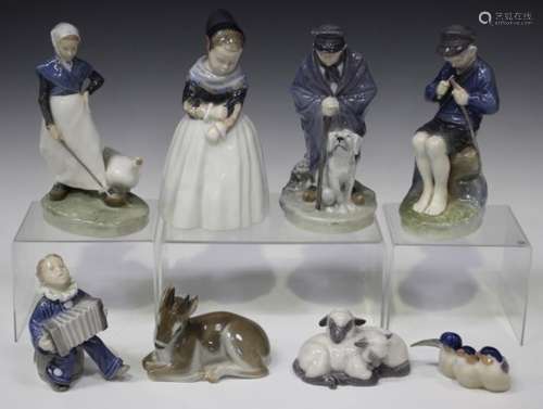 A small group of Royal Copenhagen porcelain, including five figures, a fawn, sleeping lambs and a