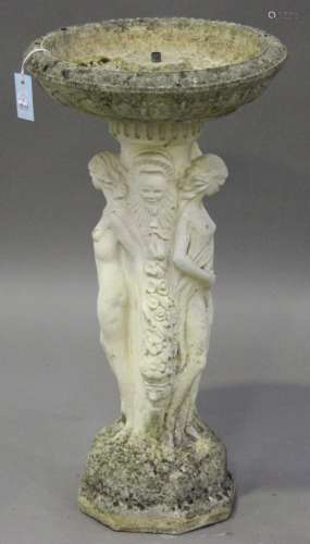A late 20th century cast composition stone garden bird bath, the stem formed as the Three Graces,