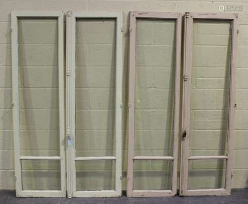 Two early 20th century matching pairs of white painted French doors, each pair with a locking handle