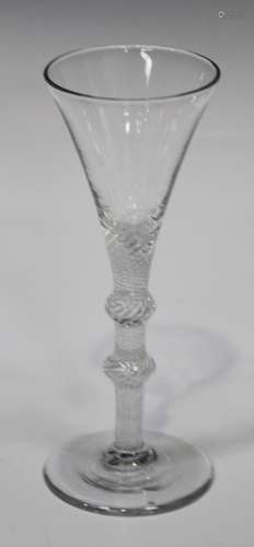 An airtwist stem wine glass, mid-18th century, the drawn trumpet bowl raised on a multi-series