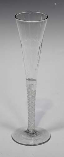 An opaque twist stem Ratafia glass, circa 1770, the trumpet bowl moulded with basal flutes, raised