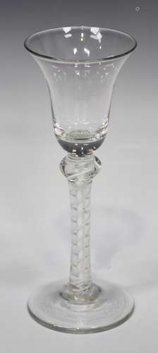 A double series opaque twist stem wine glass, circa 1770, the bell bowl raised on a shoulder knopped