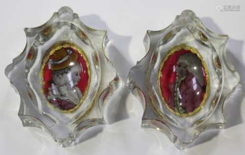 A pair of Bohemian glass salts, 19th century, of oval shape with concave rims, each applied to the