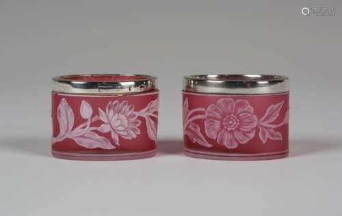 A pair of English cameo glass silver mounted salts, circa 1890, probably Webb, the red oval bodies