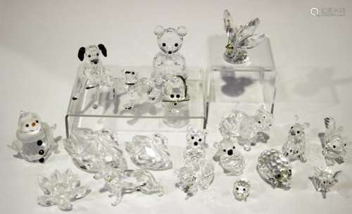 A group of Swarovski Crystal animals, including two seated bears, kangaroo, squirrel, two swans