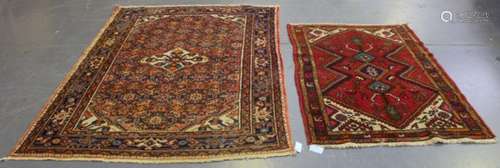 A Hamadan rug, North-west Persia, early 20th century, the pink field with an ivory medallion,