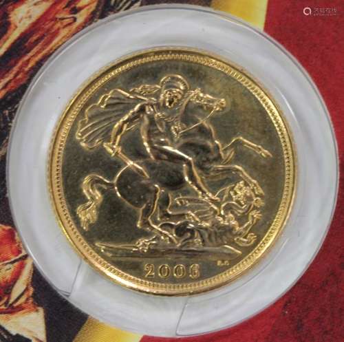 An Elizabeth II sovereign 2006, mounted on a commemorative card.Buyer’s Premium 29.4% (including VAT