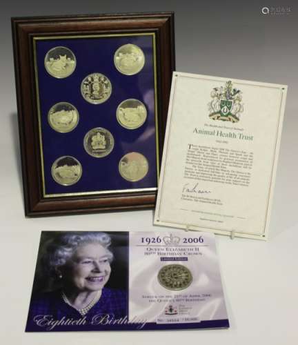 A set of eight Elizabeth II silver medallions depicting H.M. The Queen's dogs for the fiftieth