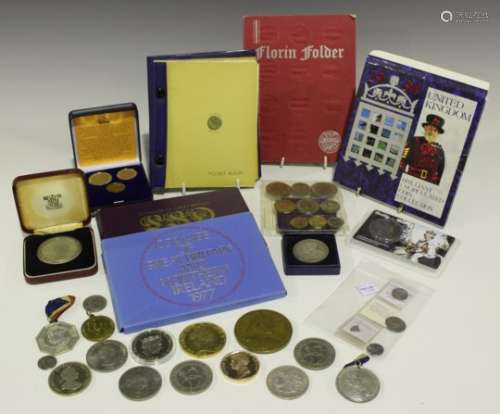 A collection of various coins and medallions, including a Charles I Scottish hammered silver