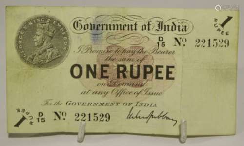 A George V Government of India one rupee banknote, error, the reverse with wrong Gujarati.Buyer’s