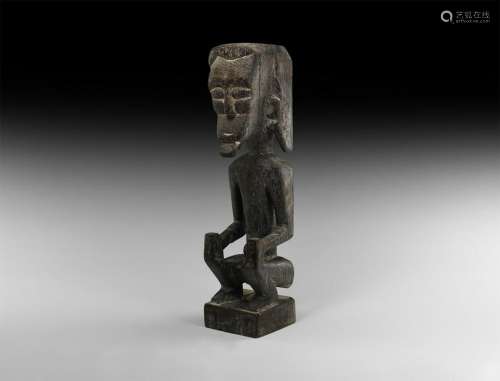 African Crouching Figure