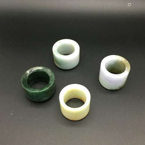 CHINESE JADEITE THUMB RINGS, GROUP OF 4