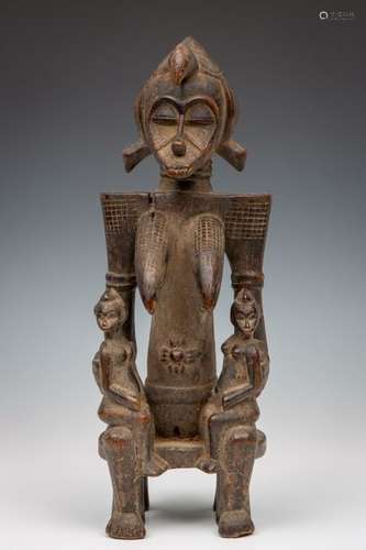 Ivory Coast, Senufo, wooden seated female figure w…