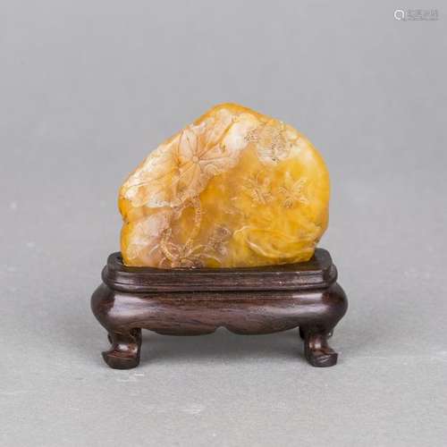 A SHOUSHAN SOAPSTONE CARVING WITH HARDWOOD STAND