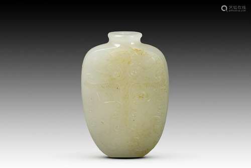 A CARVED WHITE JADE SNUFF BOTTLE