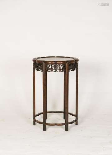 A CHINESE CYLINDERICAL HARDWOOD STOOL