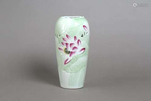 AN OPEN WORK DESIGNED PORCELAIN VASE