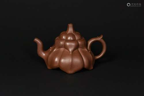 A PUMPKIN-SHAPED ZISHA TEAPOT WITH COVER