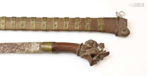 Nias, knife, ca. 1900,the handle topped by a lasar…