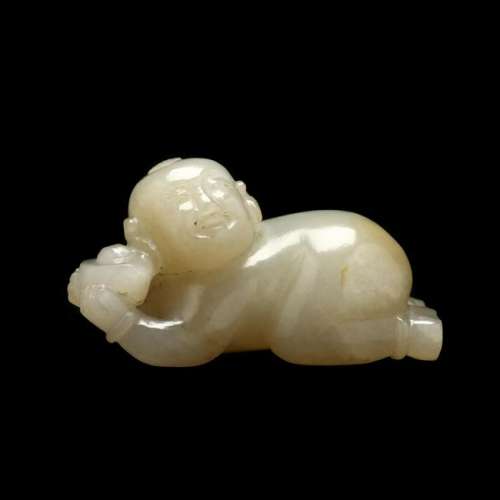 A Chinese Carved Hardstone Child