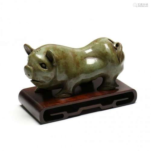 An Asian Hard Stone Pig with Stand