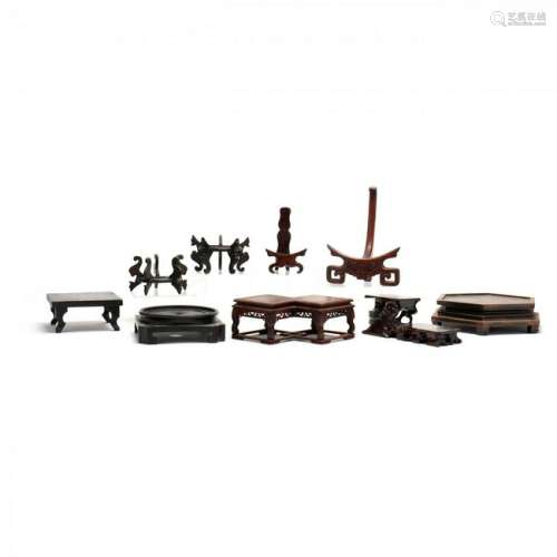 A Group of 9 Chinese Carved Wooden Stands and Plate