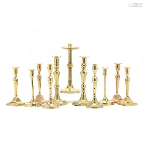 Eleven Antique Brass Candlesticks