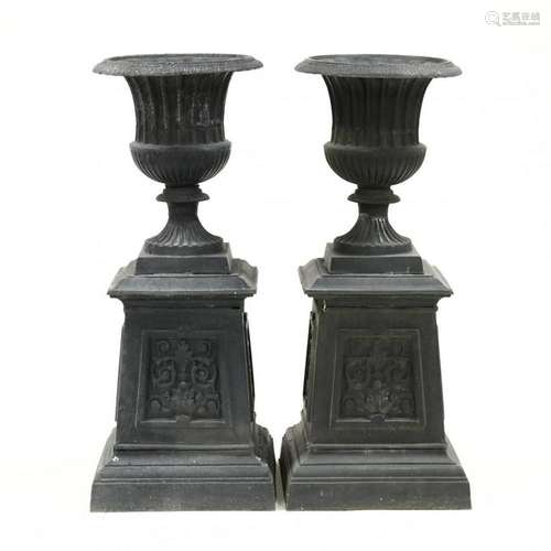 Pair of Classical Style Cast Aluminum Urns on Socles