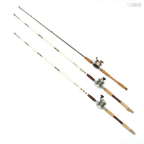 Three Vintage Fishing Rods with Reels