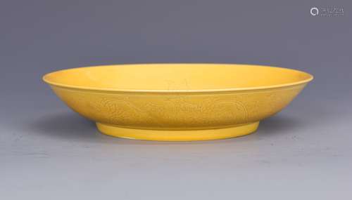 YELLOW GROUND AND CARVED 'FLOWERS' DISH