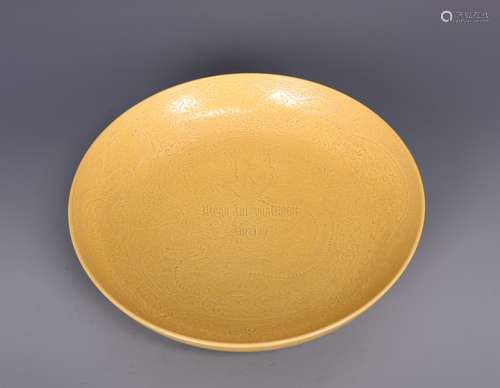 YELLOW GROUND AND CARVED 'DRAGON' DISH