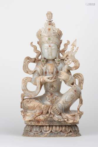 A FINE CARVED JADE GUANYIN