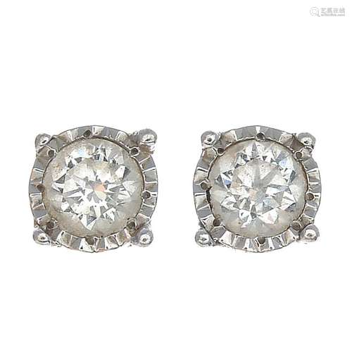 (23382) A pair of diamond earrings.Estimated total diamond weight 0.40ct,