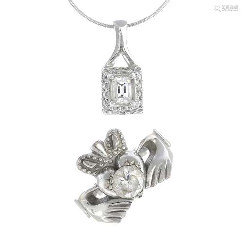 (23854) An 18ct gold diamond Claddagh ring and an 18ct gold diamond pendant,