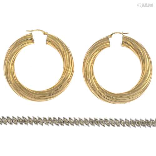 (23433) A pair of 9ct gold hoop earrings,