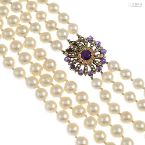 (23917) A three-row cultured pearl necklace,