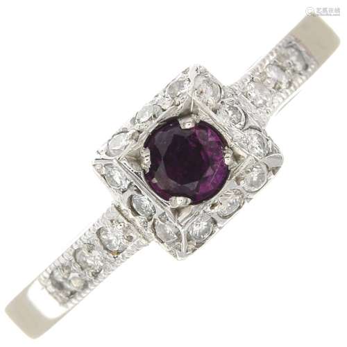 An 18ct gold ruby and diamond ring.Estimated total diamond weight 0.20ct.Hallmarks for Edinburgh,