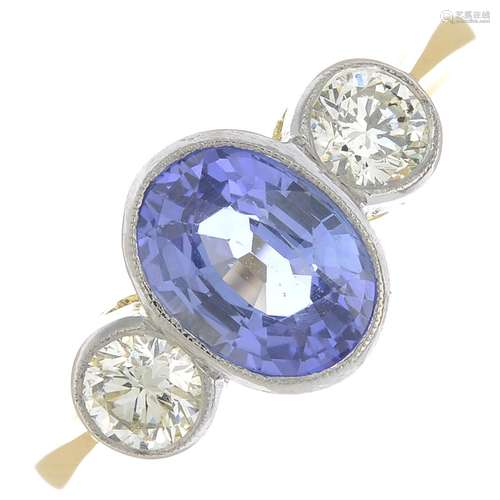 A sapphire and diamond three-stone ring.Calculated sapphire weight 1.61cts,