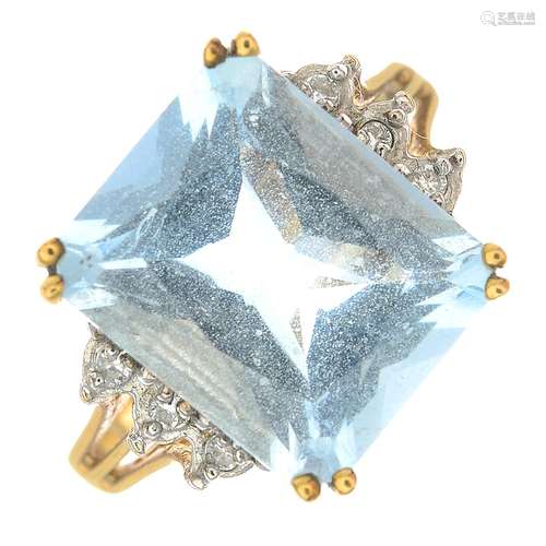 A 9ct gold aquamarine and diamond ring.Calculated aquamarine weight 6.15cts,