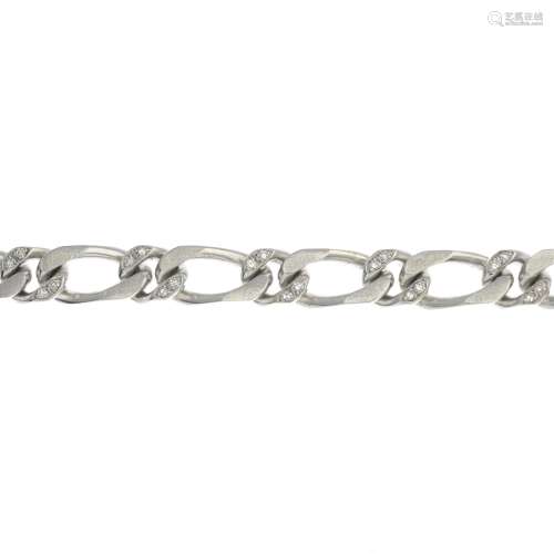 A 14ct gold diamond bracelet.Estimated total diamond weight 0.75ct.Import marks for London.Length