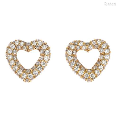 A pair of 18ct gold diamond heart-shape earrings.Total diamond weight 0.82ct.Hallmarks for