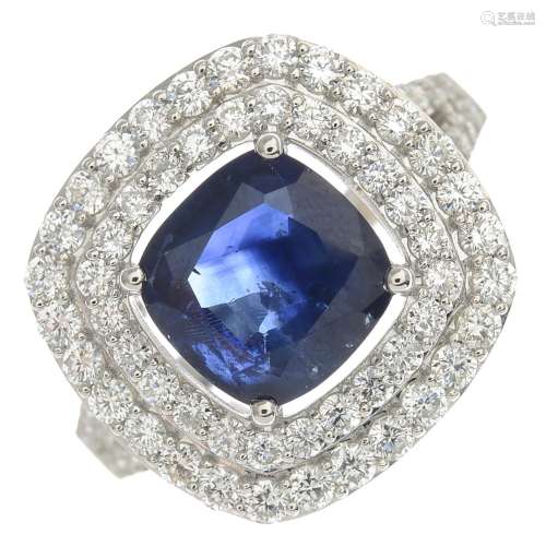 A sapphire and diamond cluster ring.Sapphire calculated weight 2.53cts,