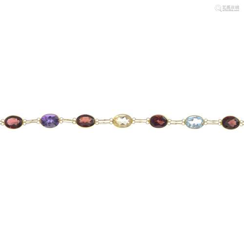 A peridot, amethyst, blue topaz, garnet and citrine bracelet.Marked 585.Length 16cms.