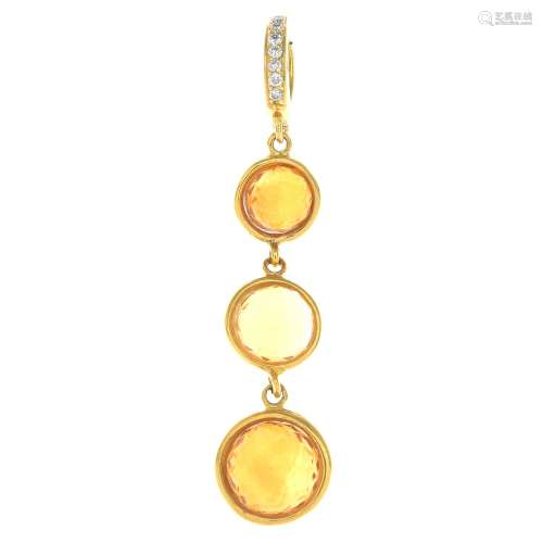 An 18ct gold citrine and diamond pendant.Total citrine weight 5.01cts.Hallmarks for