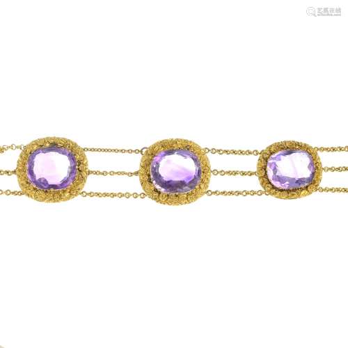 An amethyst bracelet.Principal amethyst calculated weight 10.11cts,