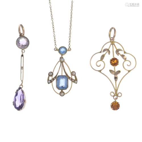 Three early 20th century gold and gem-set pendants,