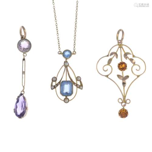 Three early 20th century gold and gem-set pendants,