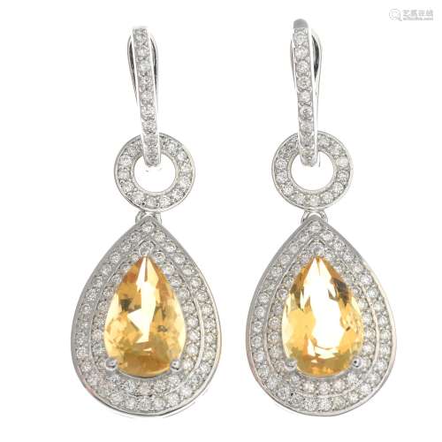A pair of citrine and diamond drop earrings.Citrine calculated weight 4.61cts,