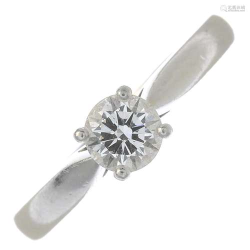 A platinum brilliant-cut diamond single-stone ring.